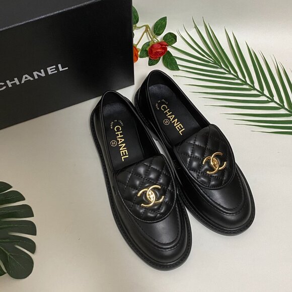 CHANEL Black and Gold Quilted Loafers - Picture 1 of 8